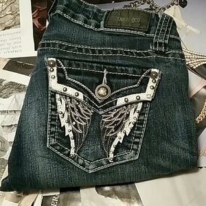 Zco skinny jeans with angel wing pockets.