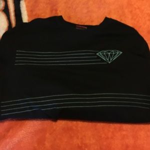 A black diamond supply crew neck sweatshirt.
