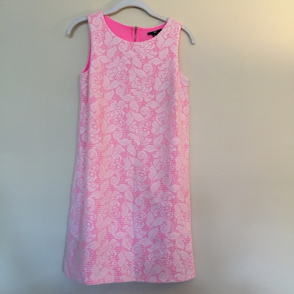 White lace dress with bright pink lining