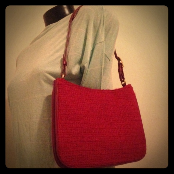Authentic stitched coach red should purse. Leather