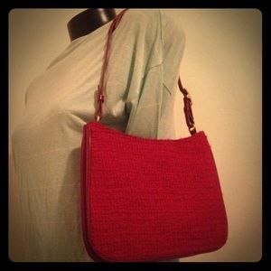 Authentic stitched coach red should purse. Leather
