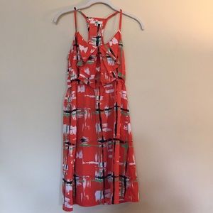 Orange dress with green, black, white design