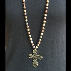 Stone and leather necklace with filagree cross