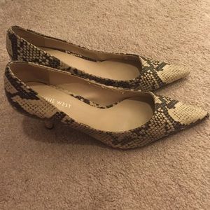 Gently worn Nine West snake skin pumps. Size 8.5.
