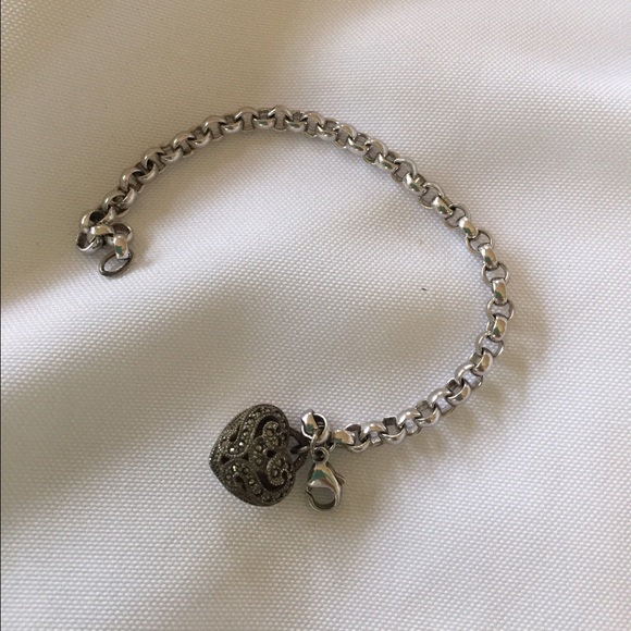 Silver bracelet with charm