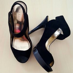 Black ankle strap suede heels