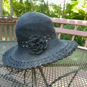 Crochet floppy hat.