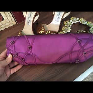 purple satin Christian Louboutin clutch