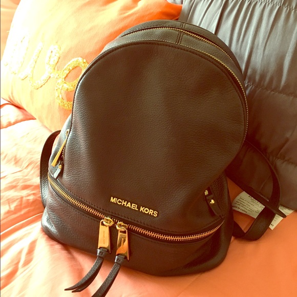 Authentic Michael Kors black leather backpack