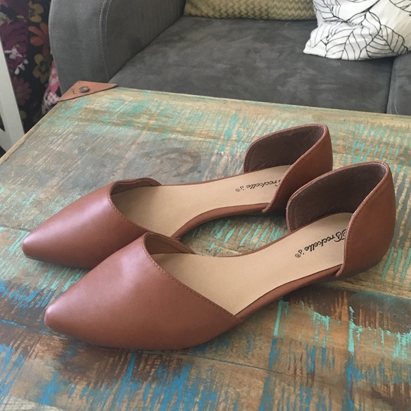 Never worn brown flats.