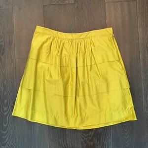Bright green J. Crew skirt with layered detailing