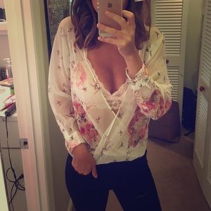 Sheer fold-over blouse.