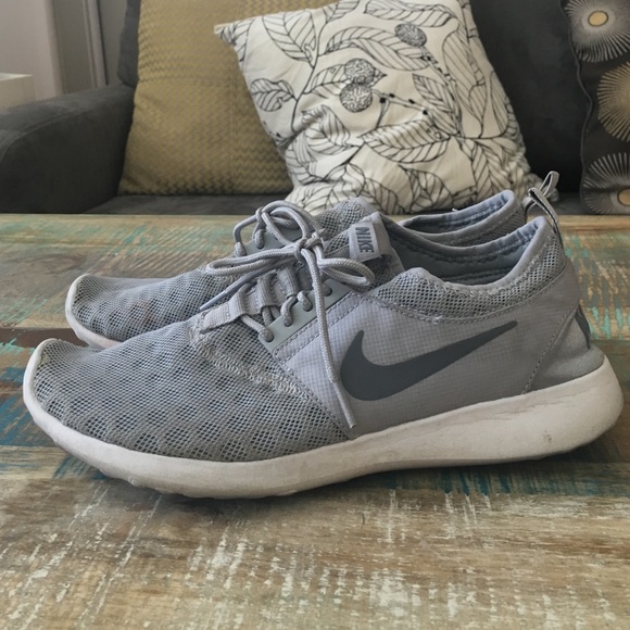 Grey Nike shoes.