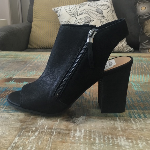 Peep toe side zip black booties!!