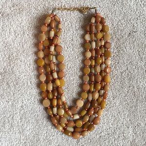 Neutral colored beaded statement necklace