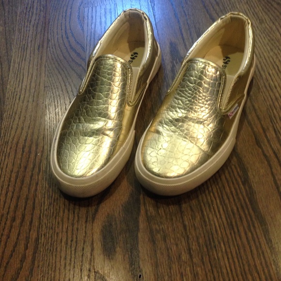 Gold slip on shoes. Size 6 1/2
