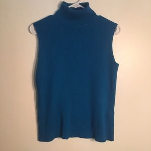 Blue sleeveless turtleneck
