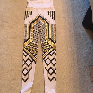 White blank and gold print leggings