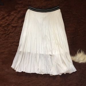 White with black waist line, flowy skirt