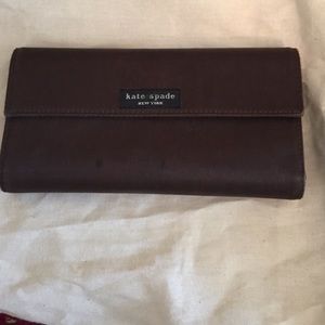 Brown Kate Spade wallet.