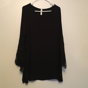 Black bell sleeve tunic.