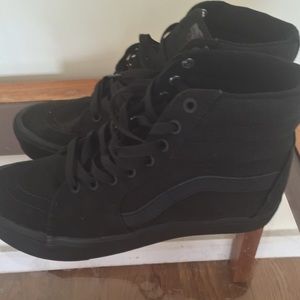 Black high-top Vans, worn once