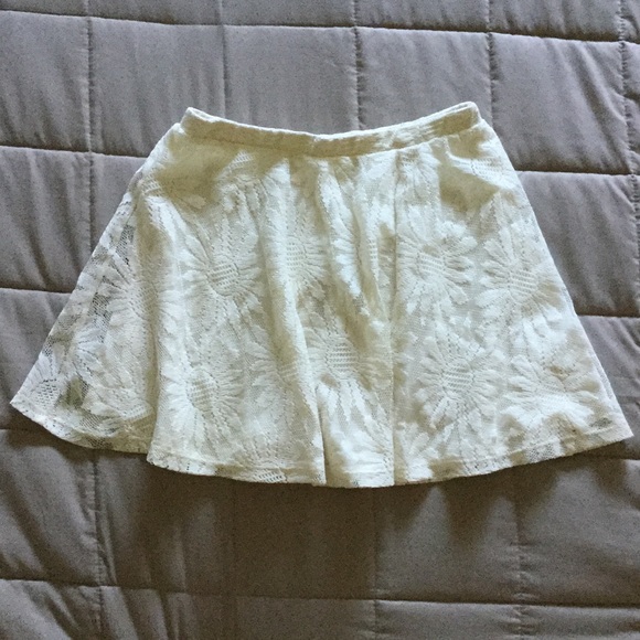 Sunflower, lined cream skirt.