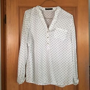 White and black polka dot blouse