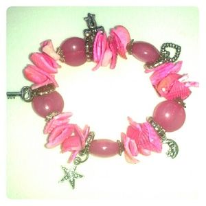Pink beaded Stretch with seashells and charns