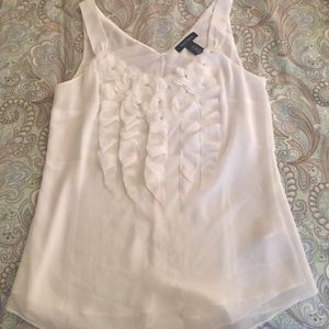 Sleeveless polyester white blouse. Worn only once!