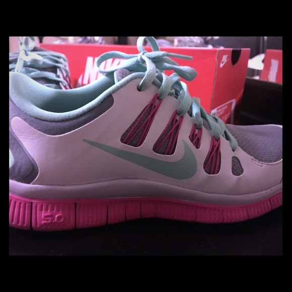 Nike tennis shoes. White, mint, gray and pink.
