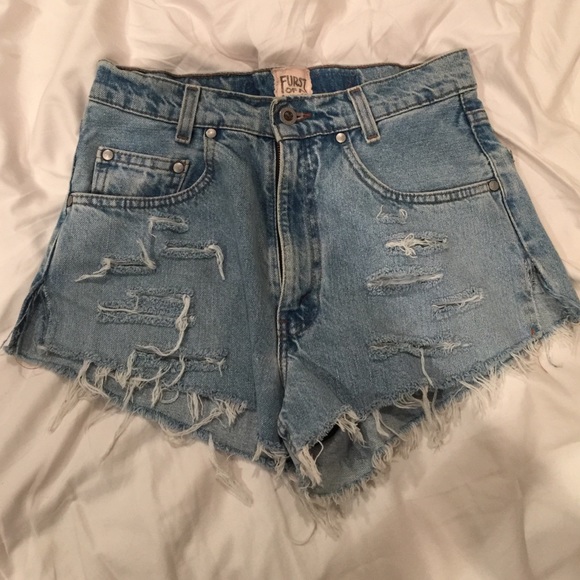 Mid rise ripped denim shorts