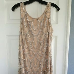 Short sequin Adrianna Pappell dress.
