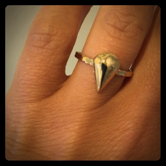 Gold ring with diamond charm