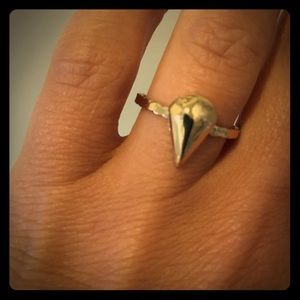 Gold ring with diamond charm