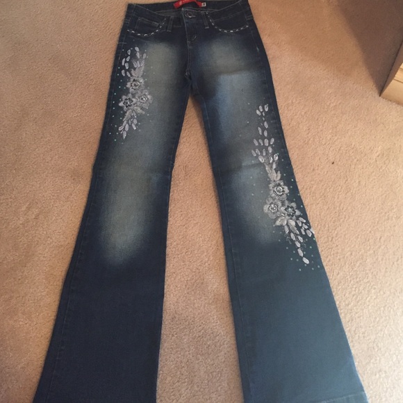 jeans with ribbon on bottom