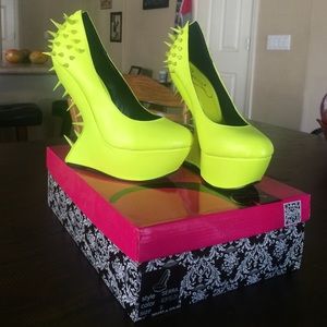 Neon spiked heels