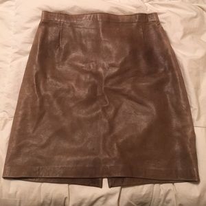 Tobacco brown leather skirt.