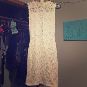 Ivory high neck lace dress.