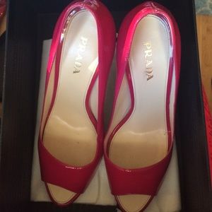 Hot pink Prada patent leather peep-toe pumps