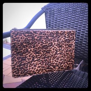 Over-sized leopard printed hair calf pouch
