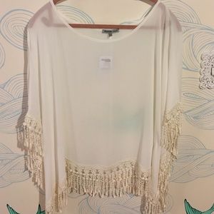 White flowy top