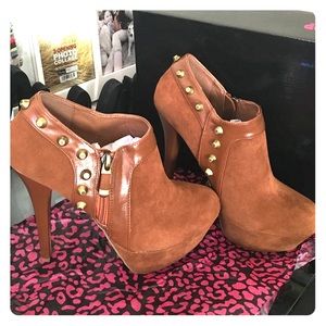 Beautiful chestnut platform heels. Brand new.