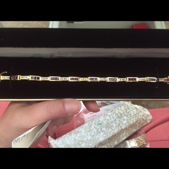 Ruby and diamond tennis bracelet.