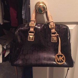 MK patent leather hand bag