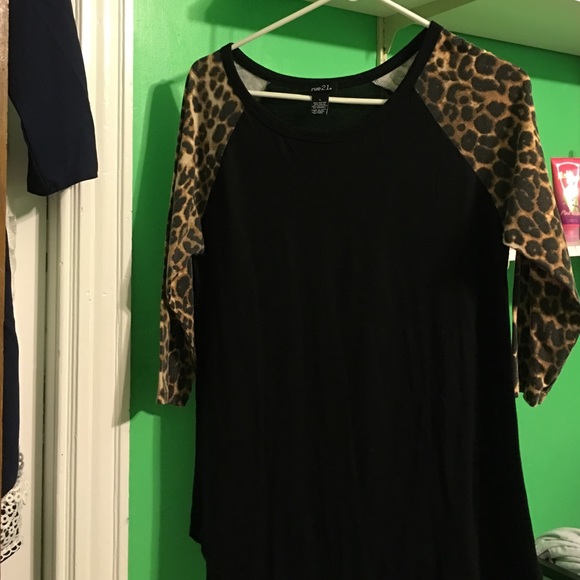 Black crew neck top with leopard print sleeves