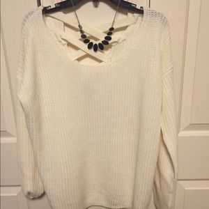 White long sleeve sweater with cross back