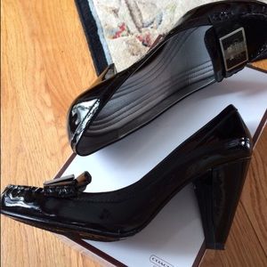 Coach Classic Patent Leather with Buckle Design.