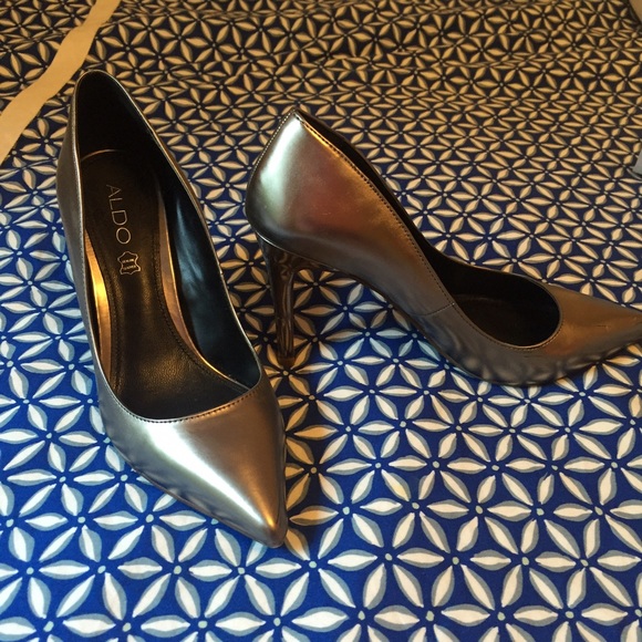 Also metallic silver pumps