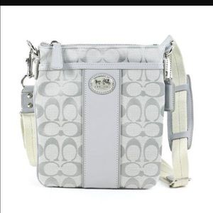Gray Coach Crossbody purse.